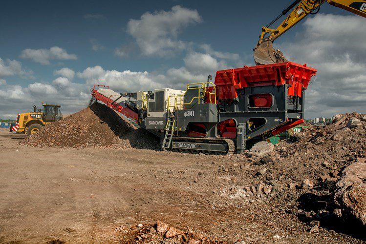 Sandvik QJ341 jaw crusher at gravel pit.